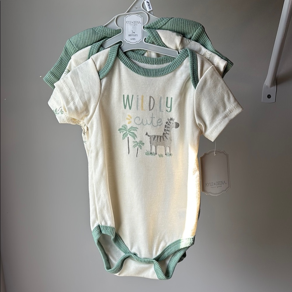 NEW! Wildly Cute zebra and giraffe print baby onesies 6-9 mo